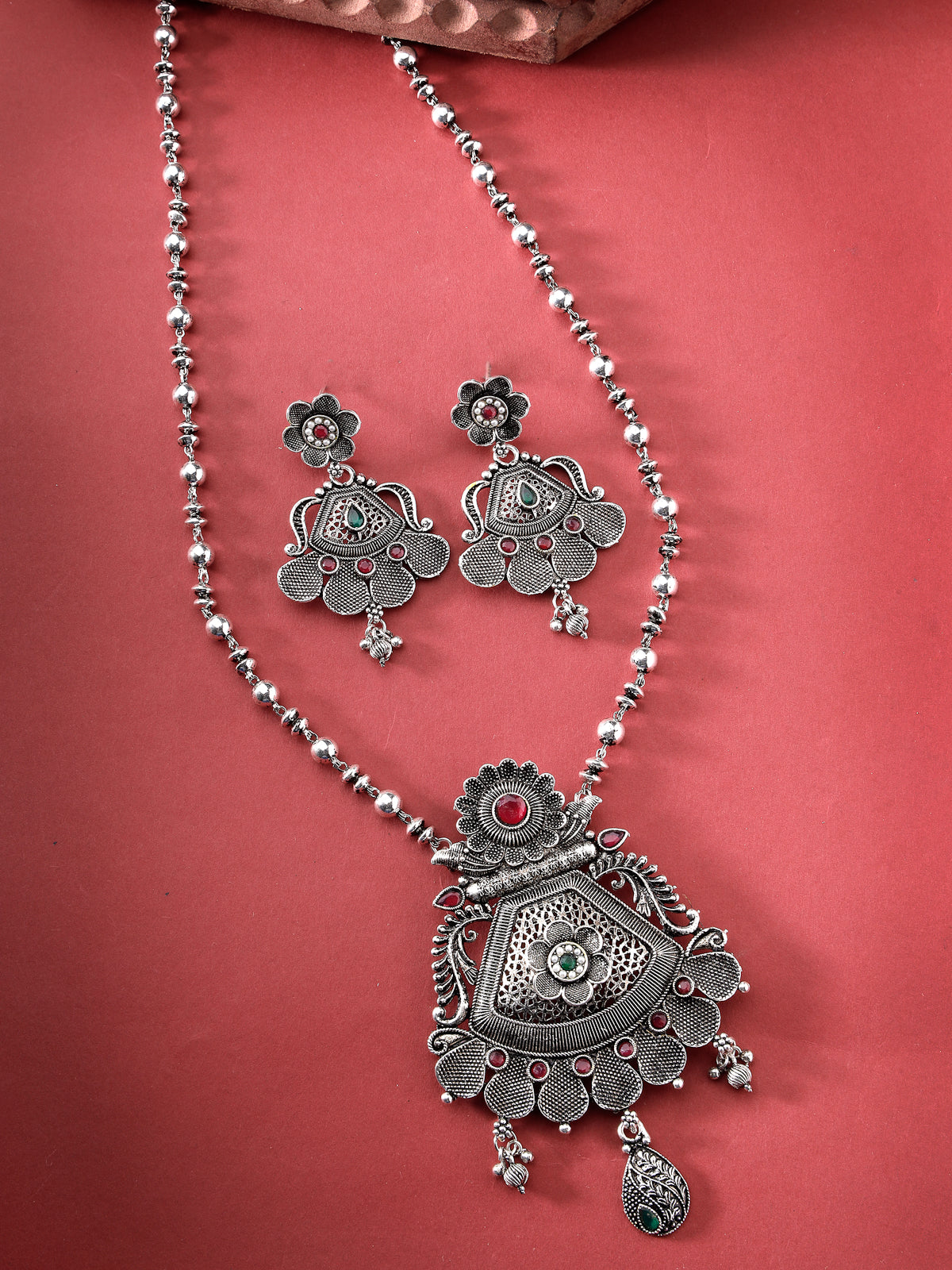 Sukkhi Decorative Oxidised Silver Plated Red AD Stones Studded Long Ball Chain with Floral Pendant Necklace Set With Dangler Earrings Jewellery Set For Women & Girls|Set of 1|NS106056