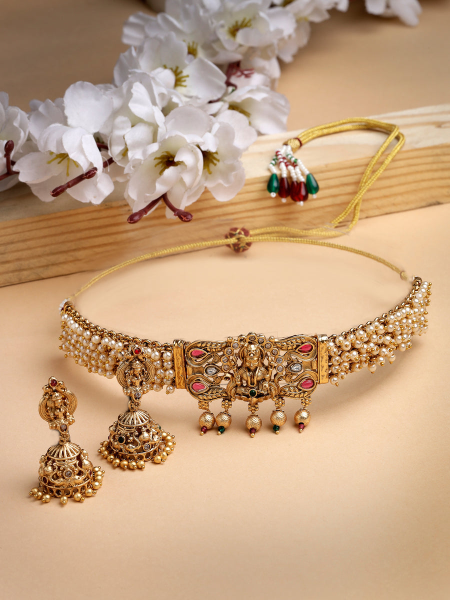 Sukkhi Classic Traditional Gold Plated with off White Pearls Temple Choker Necklace Set with Jhumka/Jhumki Earrings Jewellery Set For Women||NS106078