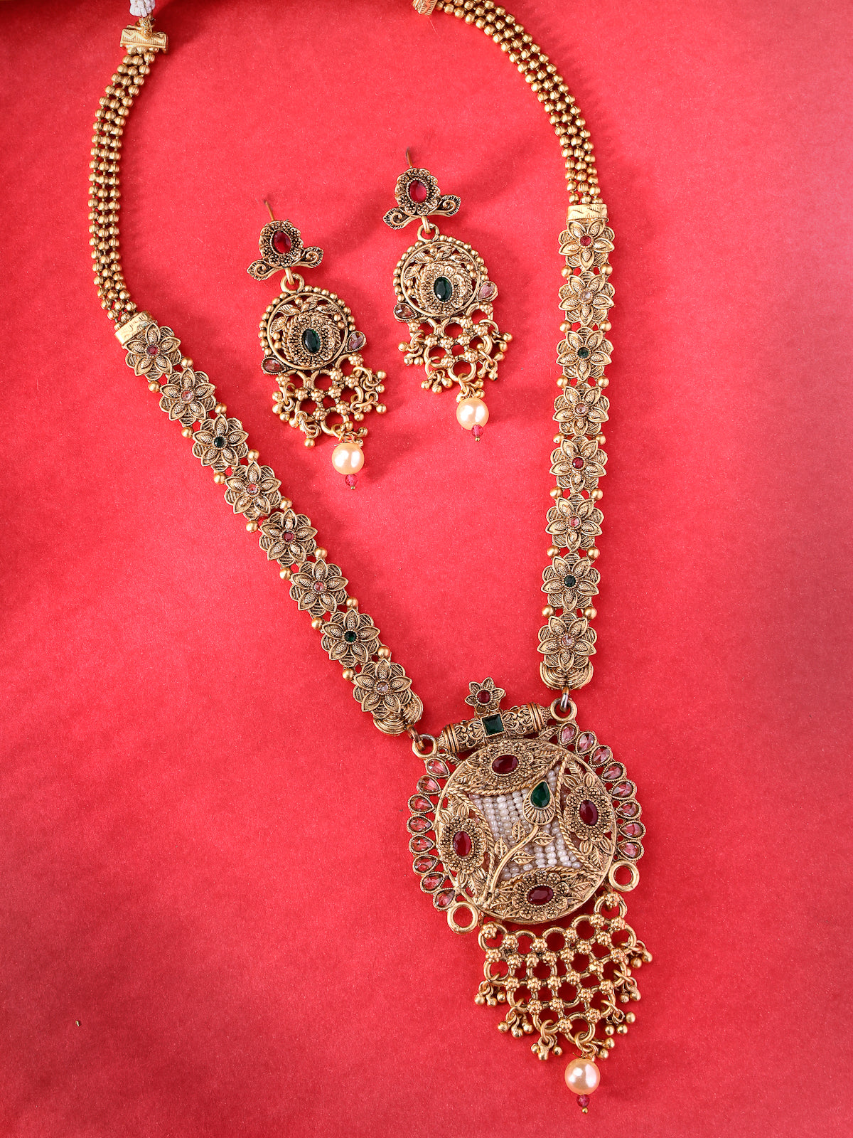 Sukkhi Heavy Look Gold Plated Red Green AD Stones Studded Floral Gold Haram Designs Long Necklace Set with Dangler Earrings Jewellery Set For Women & Girls|Set of 1|NS106087