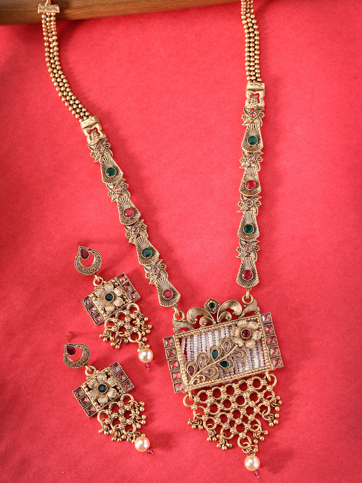 Sukkhi Latest Collection Gold Plated Red Green AD Stones Studded Floral Gold Haram Designs Long Necklace Set with Dangler Earrings Jewellery Set For Women & Girls|NS106090