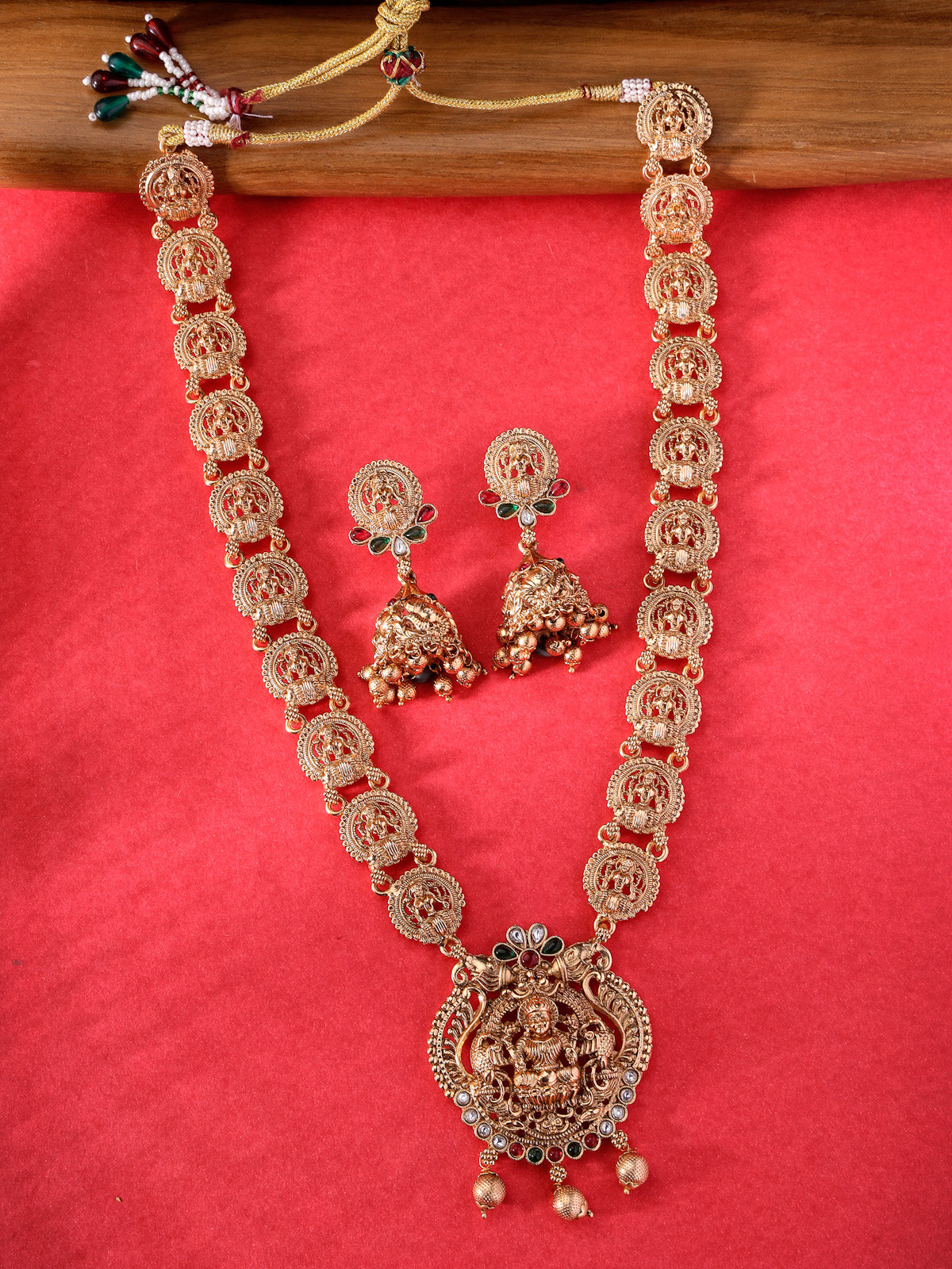 Sukkhi Beautiful Classic Gold Plated Temple Haram Designs Long Necklace Set with Jhumki/Jhumka Earrings Jewellery Set For Women & Girls|Set of 1|NS106091