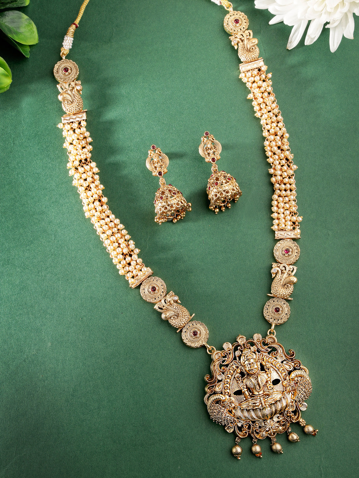 Sukkhi Trendy Fashionable Gold Plated Temple Haram Designs Long Necklace Set with Jhumki/Jhumka Earrings Jewellery Set For Women & Girls |Set of 1|NS106092