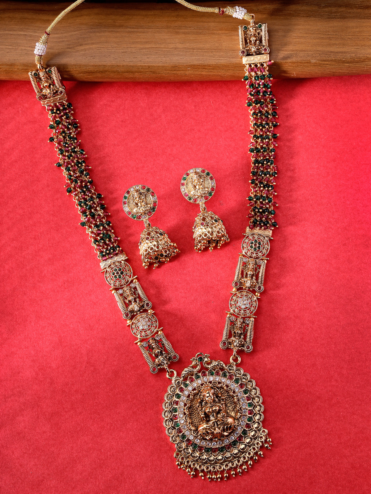 Sukkhi Attractive Traditional Gold Plated Temple Haram Designs Long Necklace Set with Jhumki/Jhumka Earrings Jewellery Set For Women & Girls| Set of 1|NS106093