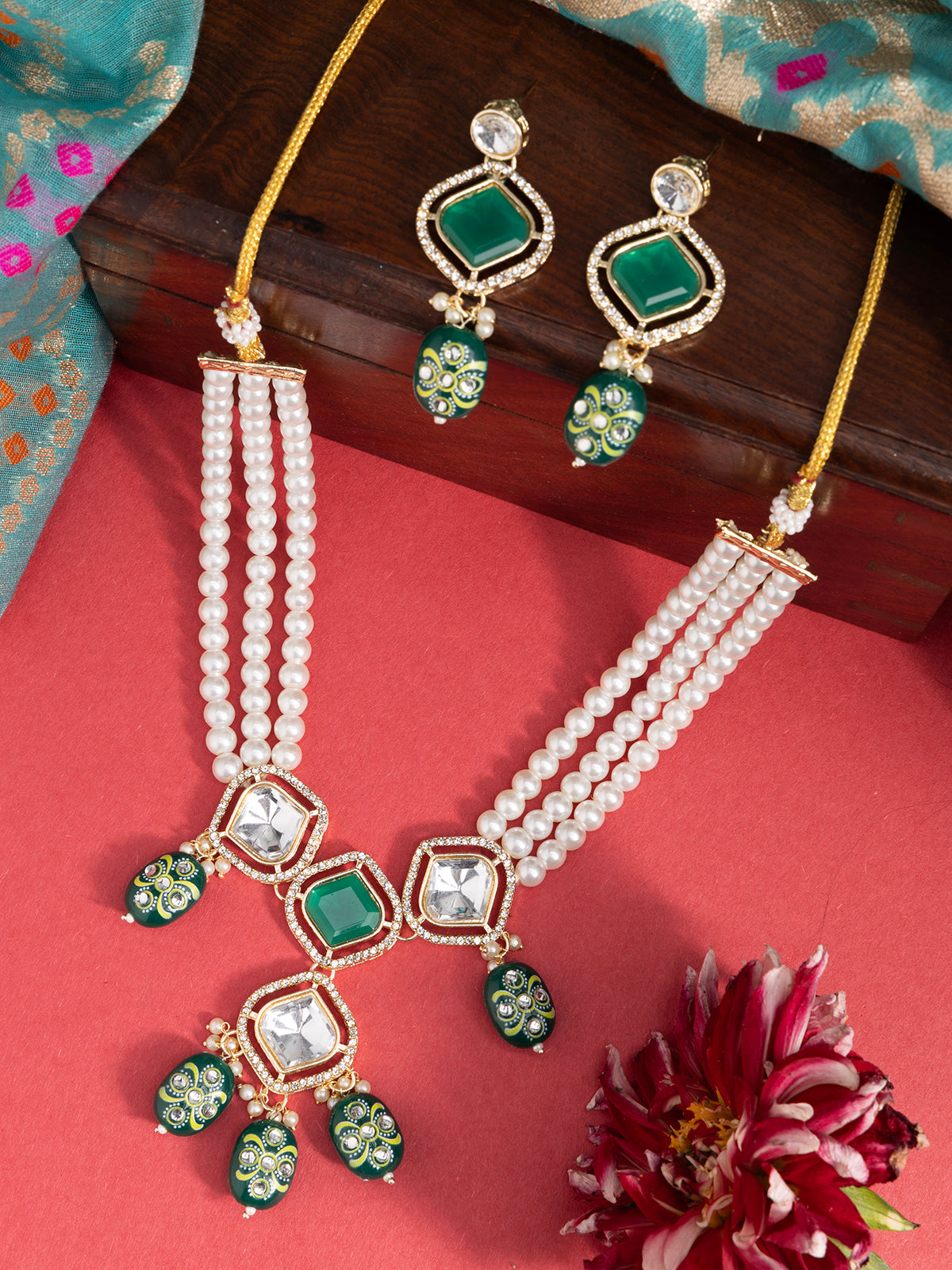 Sukkhi Creative Crystal Stone Studded Gold Plated Multi Strip Pearl Necklace Set with Drop Earring Jewellery for Women|NS107096