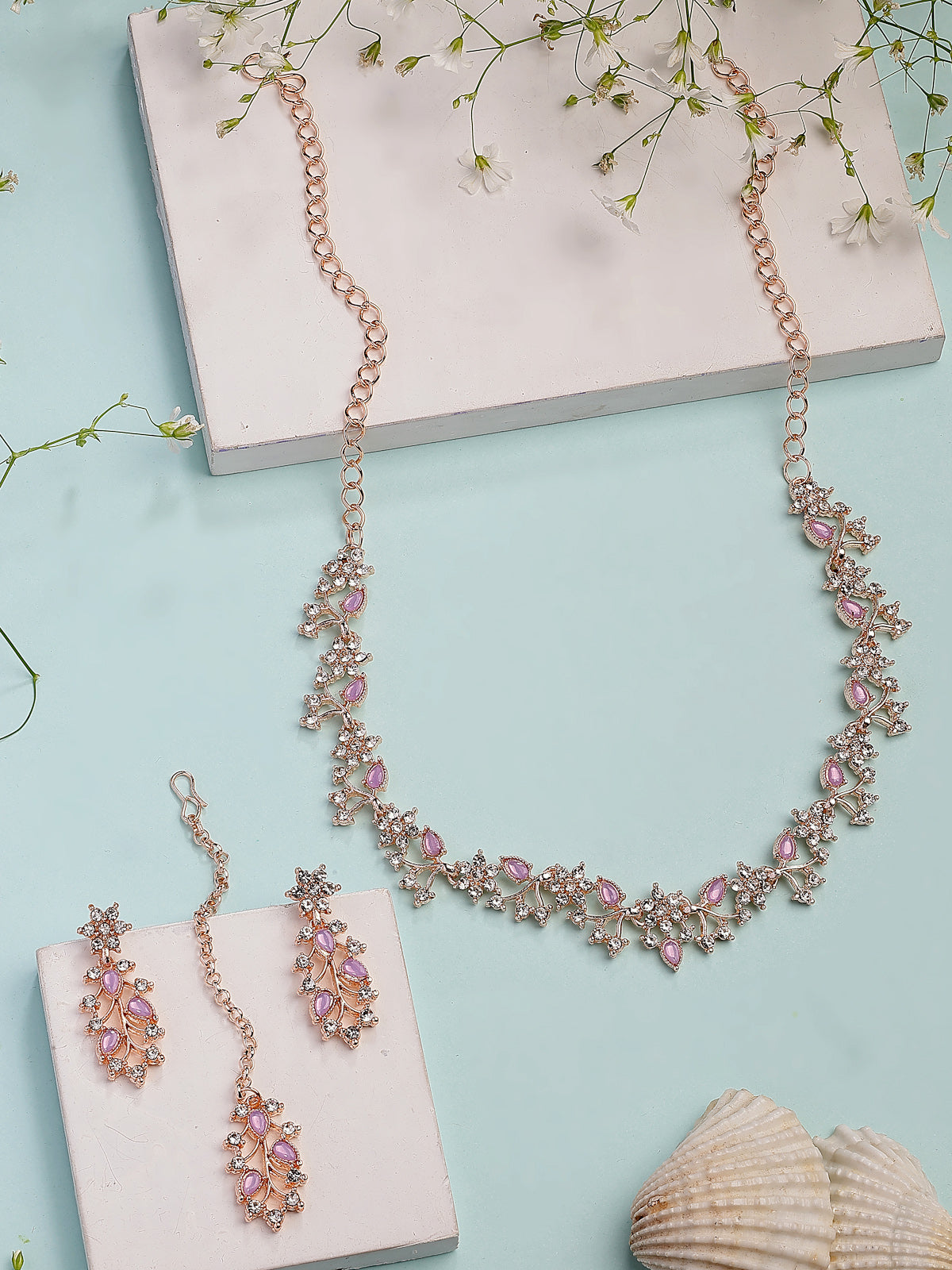 Sukkhi American Diamond AD Stone Studded Floral & Leaf Shaped Rose God Plated Purple Choker Necklace with Dangle Earring Maangtikka Jewellery Set for Women & Girls|NS107393