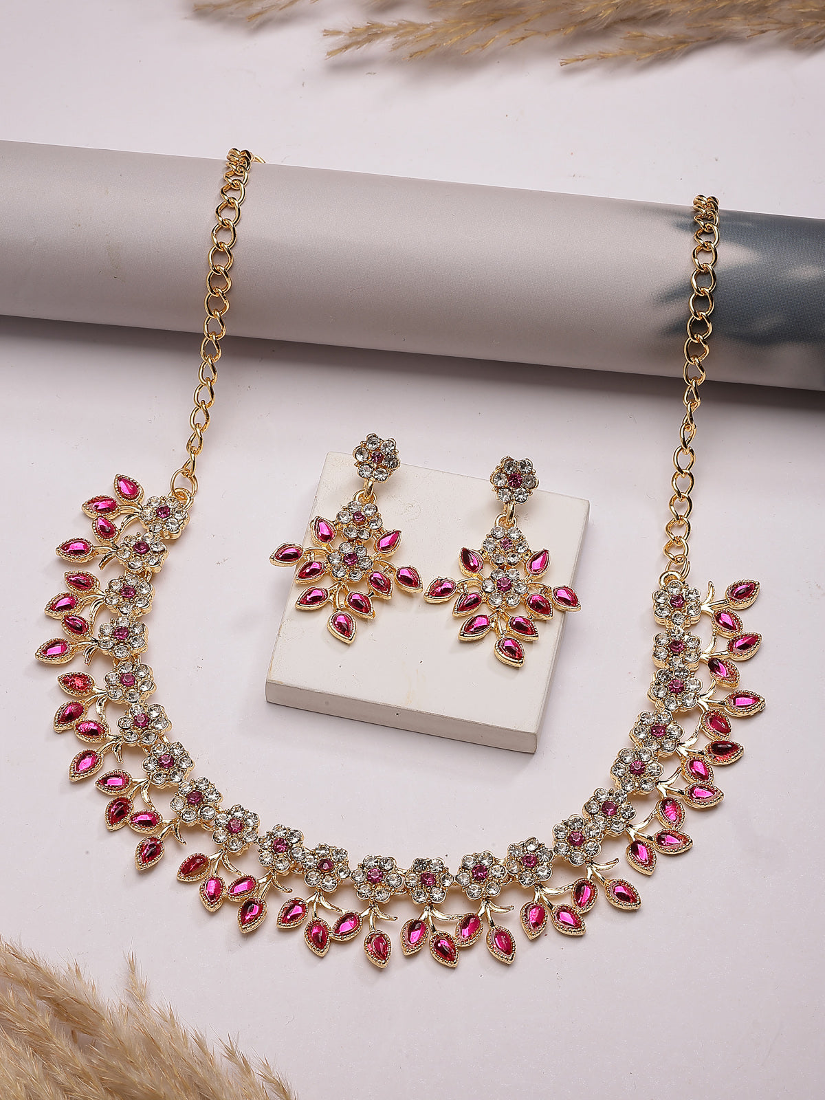 Sukkhi Charming Design Gold Plated AD Stone with Floral & Leaf Shaped Rani Pink Choker Necklace with Dangle Earring Jewellery Set For Women & Girls|NS107401