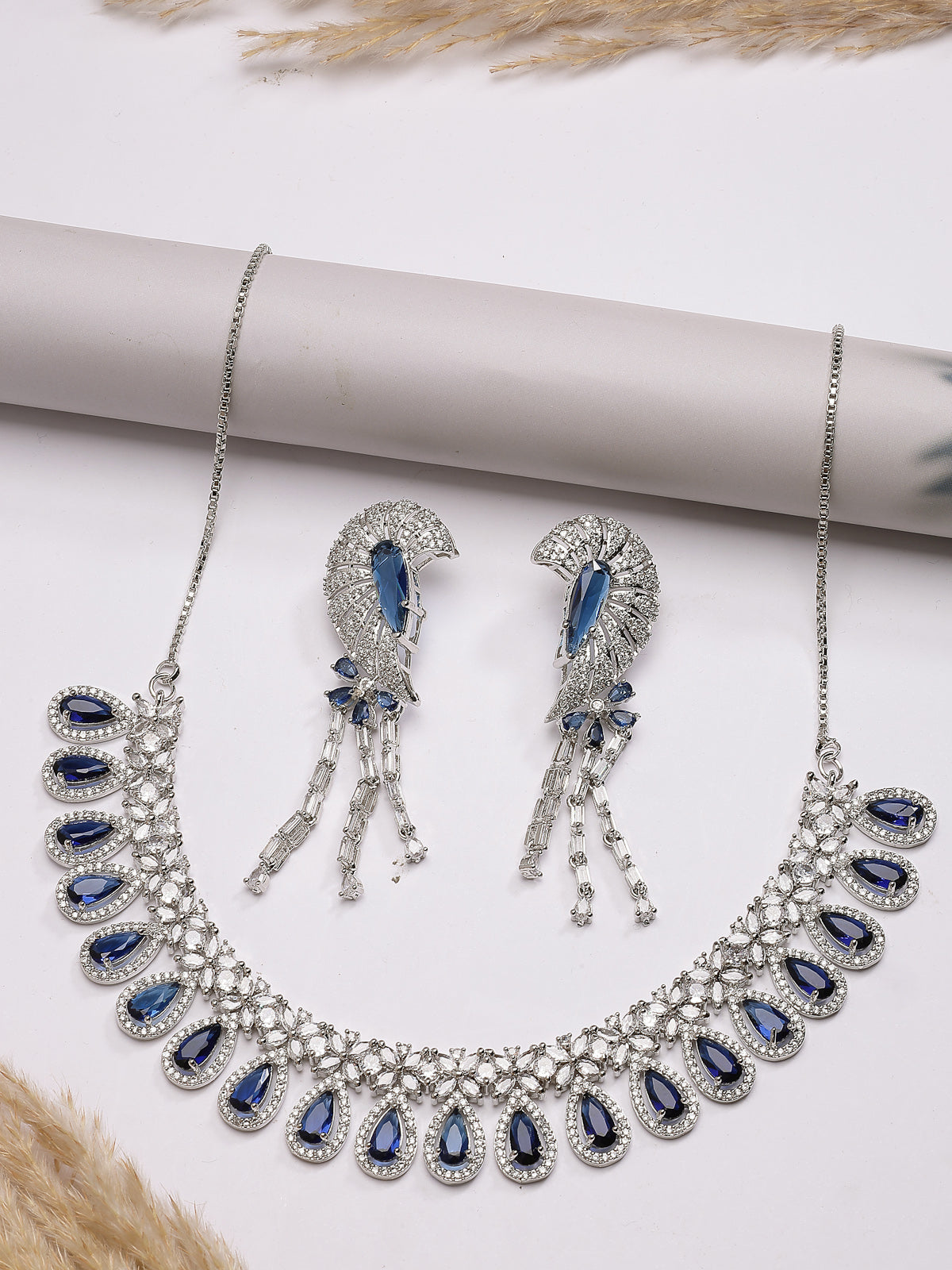 Sukkhi Lavish Fashionable Rhodium Plated Silver Toned & American Diamond StudsDrop Shaped Blue Choker Necklace With Dangle Earring Jewellery Set for Women & Girls|NS107409