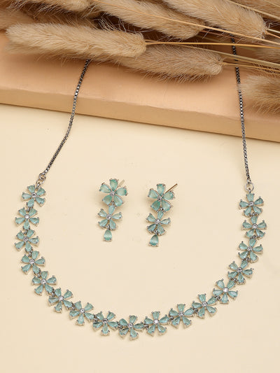 Sukkhi Attractive Rhodium Plated Silver Toned with American Diamond Studded Floral Shaped Sea Green Choker Necklace with Drop Earring Jewellery Set For Women & Girls|NS107418