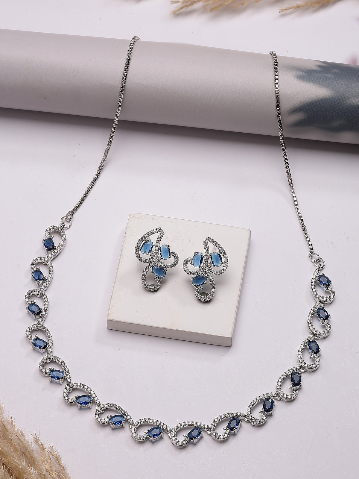 Sukkhi Western Fashion Style Rhodium Plated with Silver Toned Cubic Zirconia Stones Studded Blue Choker Necklace with Studs Earring Jewellery Set For Women & Girls|NS107426