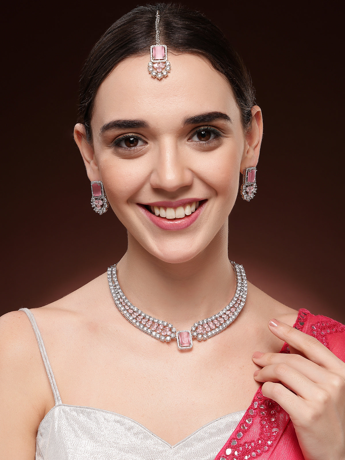 Sukkhi Preety Pink Stylish Rhodium Plated Cubic Zirconia Diamond Studded Brass Collar Necklace with Studs Earring & Maangtikka Jewellery Set for Women|Latest Stylish Gifts for All Occasions|NS115974