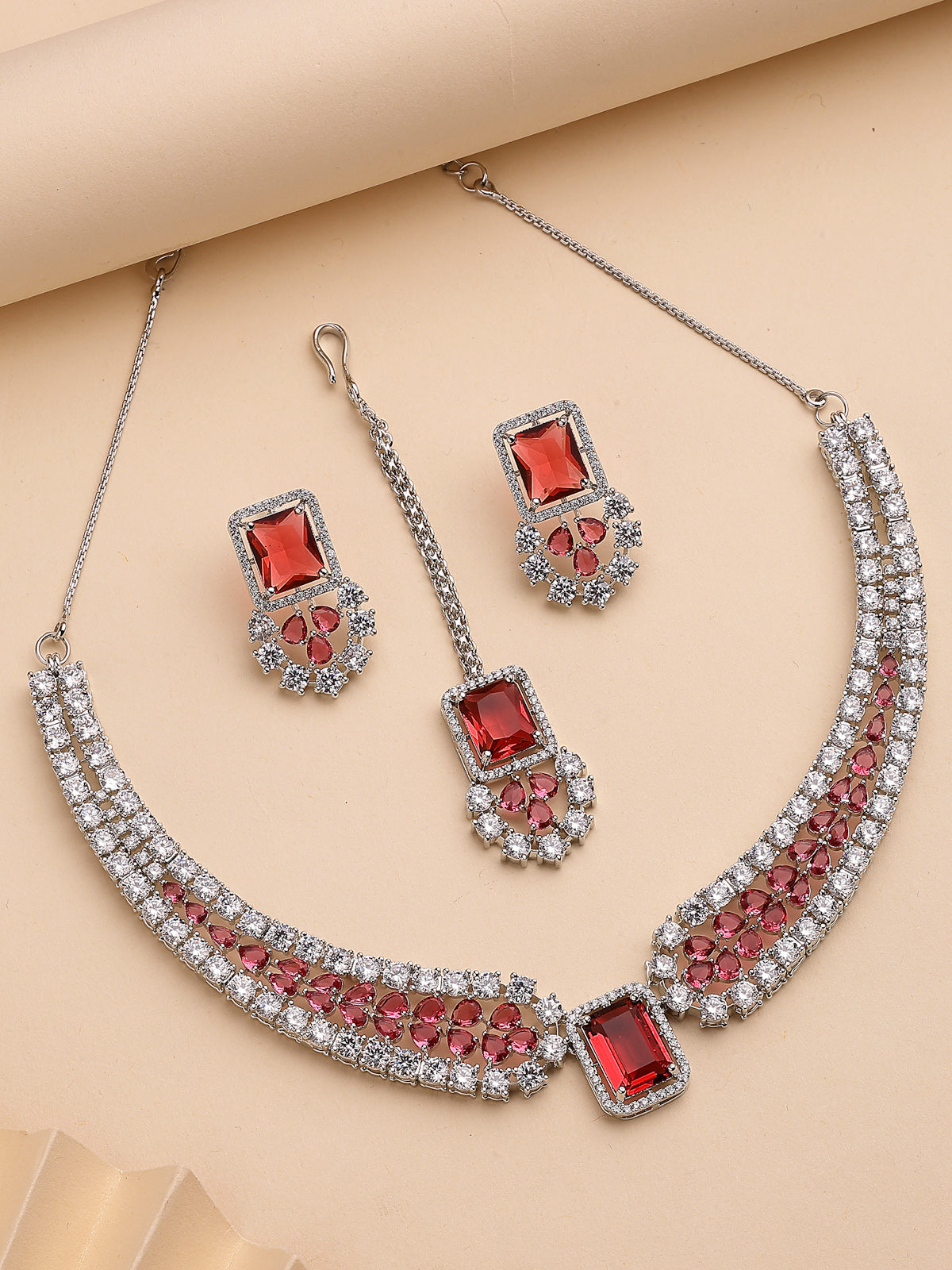 Sukkhi Charming Fashionable Rhodium Plated Red Cubic Zirconia Studded Brass Collar Necklace with Studs Earring & Maangtikka Jewellery Set for Women|Latest Stylish Gifts for All Occasions|NS115975