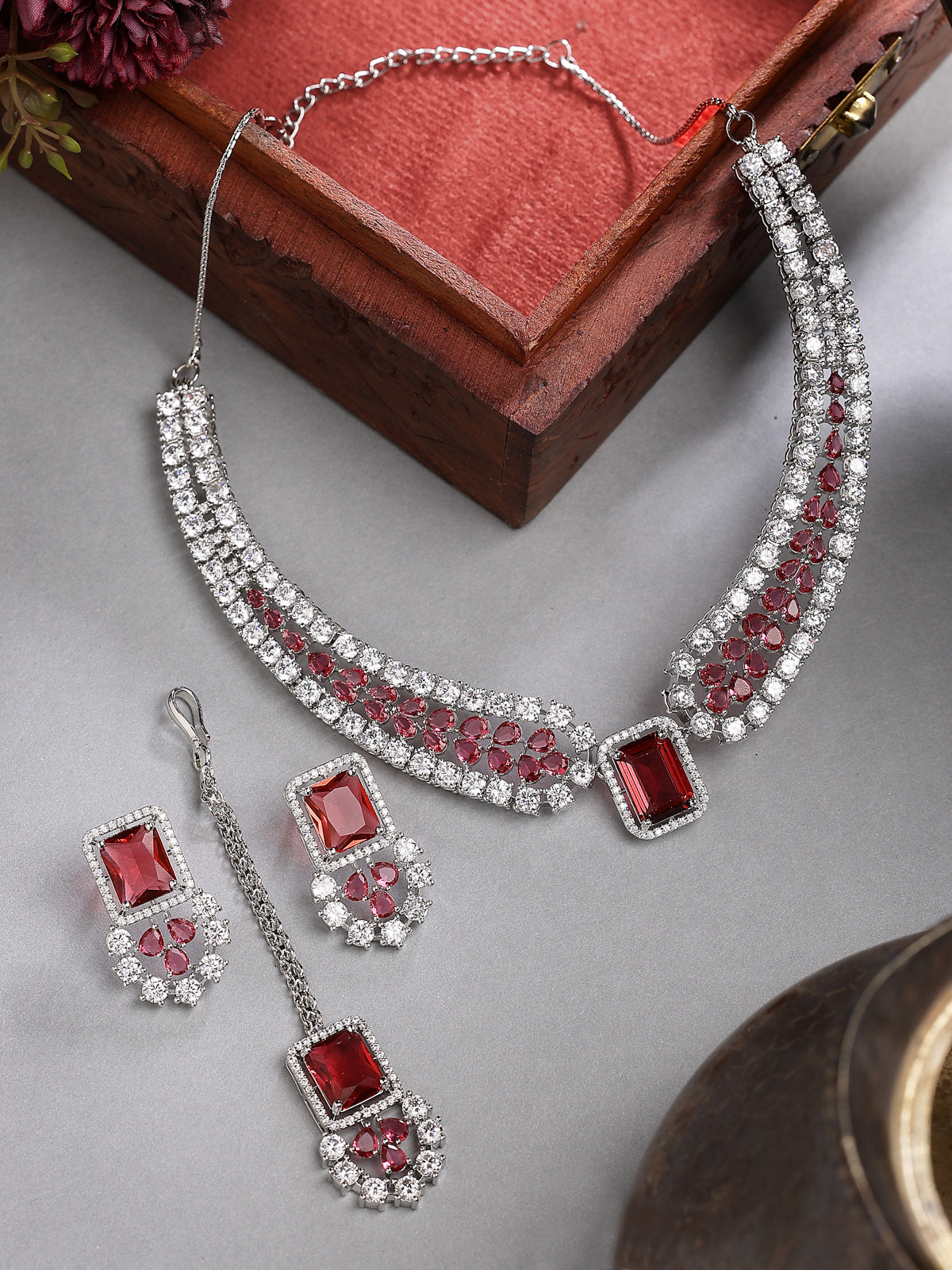 Sukkhi Charming Fashionable Rhodium Plated Red Cubic Zirconia Studded Brass Collar Necklace with Studs Earring & Maangtikka Jewellery Set for Women|Latest Stylish Gifts for All Occasions|NS115975