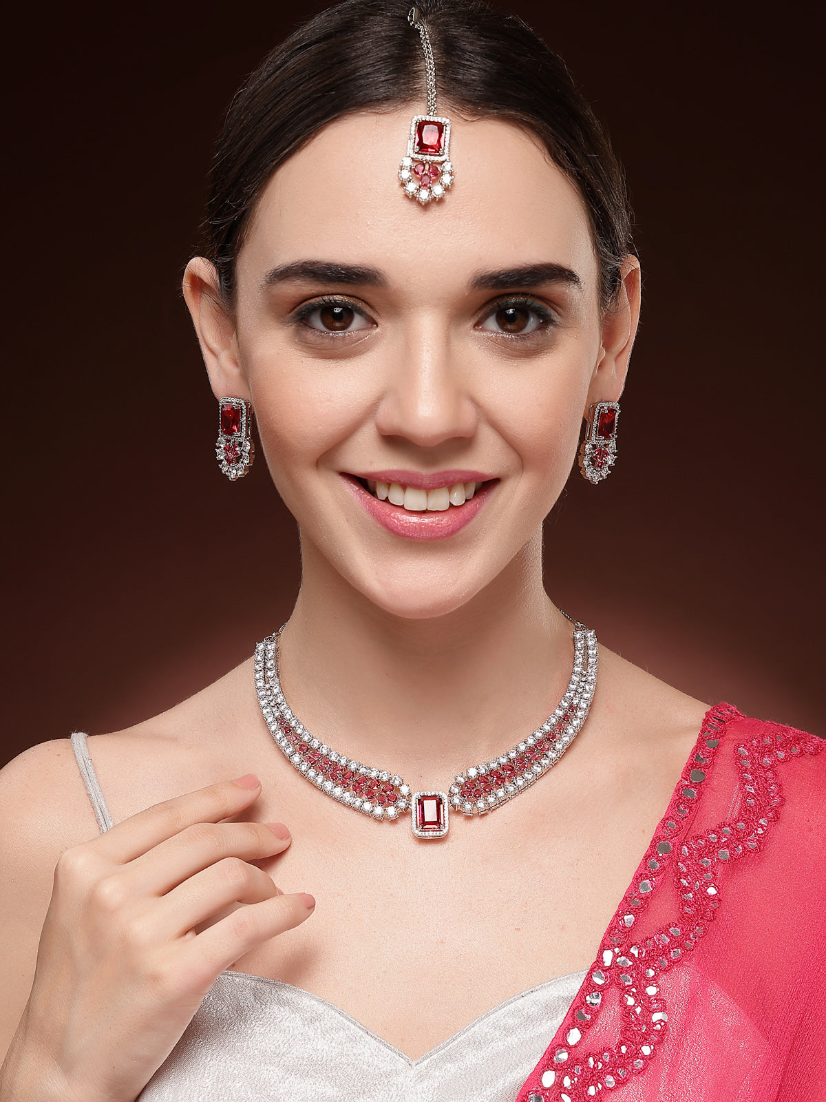 Sukkhi Charming Fashionable Rhodium Plated Red Cubic Zirconia Studded Brass Collar Necklace with Studs Earring & Maangtikka Jewellery Set for Women|Latest Stylish Gifts for All Occasions|NS115975