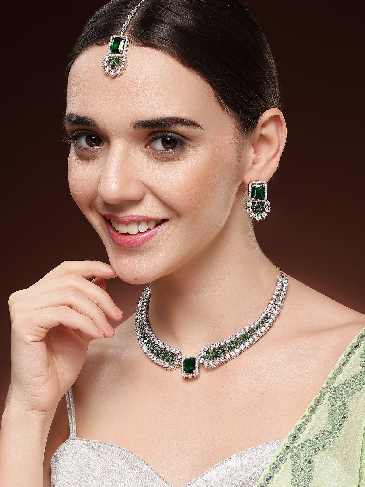Sukkhi Latest Stylish Rhodium Plated Cubic Zirconia Studded Brass  Emerald Green Collar Necklace & Studs Earring & Maangtikka Jewellery Set for Women|Latest Stylish Gifts for All Occasions|NS115977