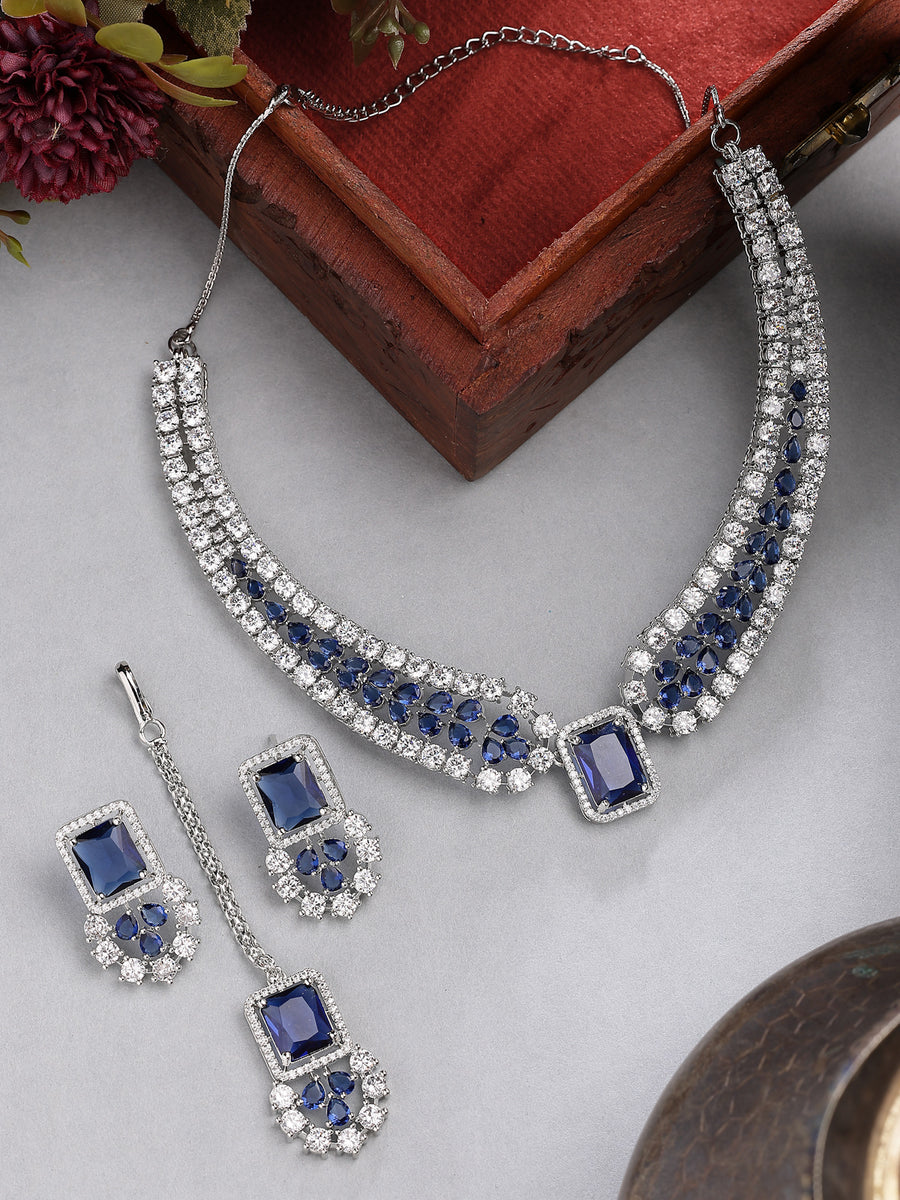 Sukkhi Royal Blue Fashionable Rhodium Plated Cubic Zirconia Studded Brass Collar Necklace with Studs Earring & Maangtikka Jewellery Set for Women|Latest Stylish Gifts for All Occasions|NS115978