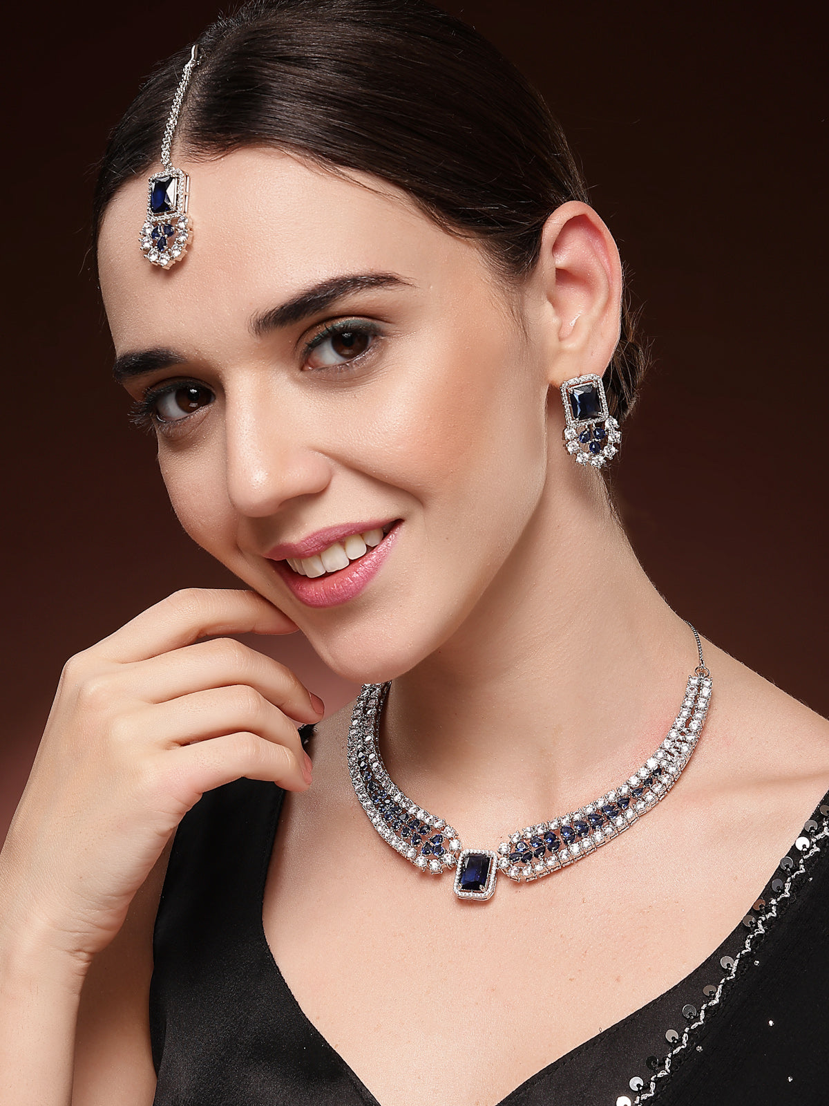 Sukkhi Royal Blue Fashionable Rhodium Plated Cubic Zirconia Studded Brass Collar Necklace with Studs Earring & Maangtikka Jewellery Set for Women|Latest Stylish Gifts for All Occasions|NS115978