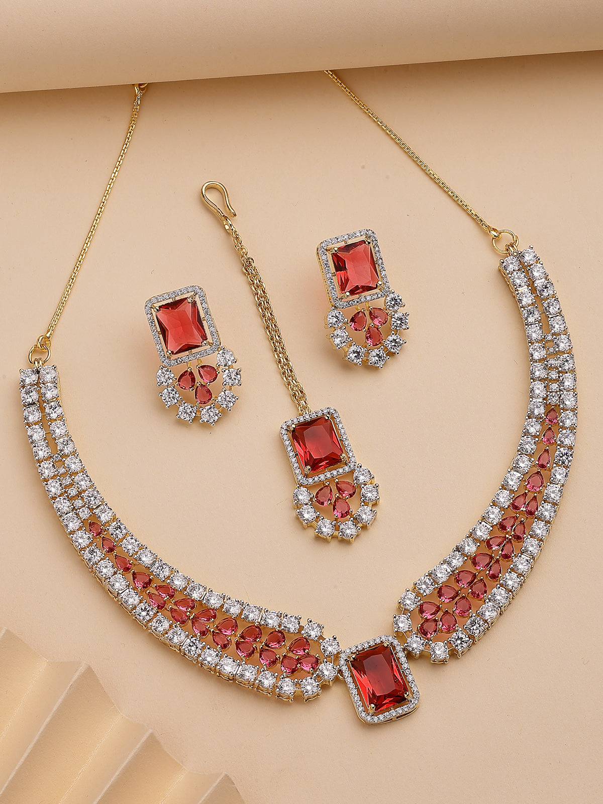 Sukkhi Unique Stylish & Designable Gold Plated Cubic Zirconia Studded Brass Red Collar Necklace with Studs Earring & Maangtikka Jewellery Set for Women|Latest Stylish Gifts for All Occasions|NS115980