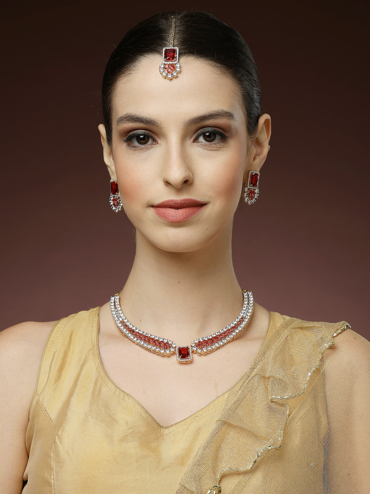 Sukkhi Unique Stylish & Designable Gold Plated Cubic Zirconia Studded Brass Red Collar Necklace with Studs Earring & Maangtikka Jewellery Set for Women|Latest Stylish Gifts for All Occasions|NS115980