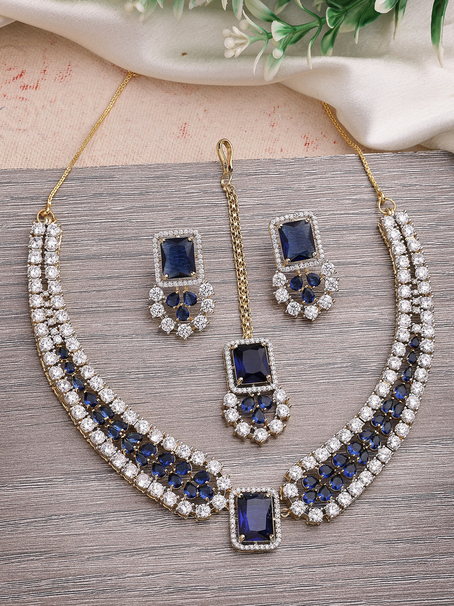 Sukkhi Sparkling Royal Blue Gold Plated with Cubic Zirconia Studded Brass Collar Necklace with Studs Earring & Maangtikka Jewellery Set for Women|Latest Stylish Gifts for All Occasions|NS115983