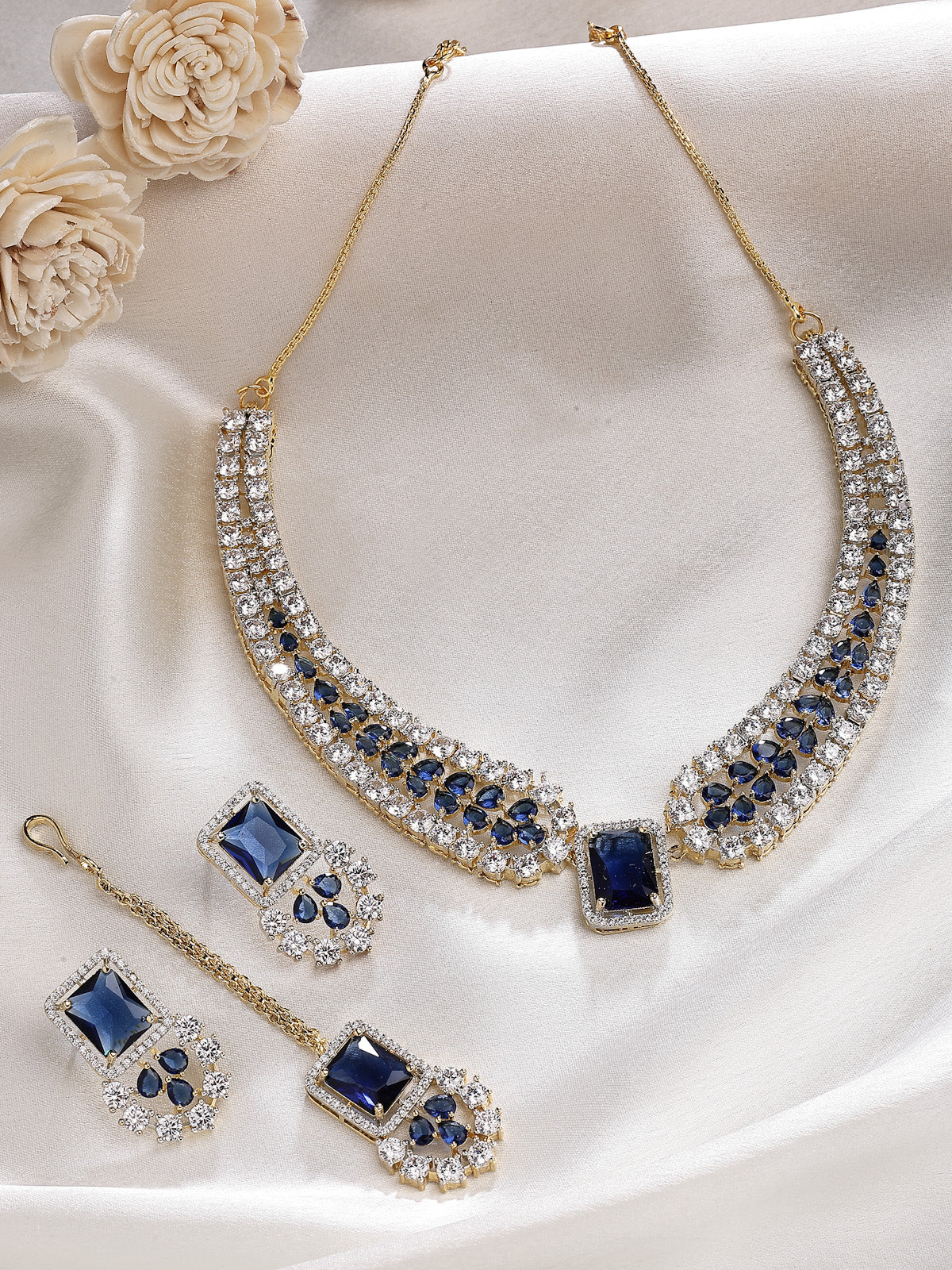 Sukkhi Sparkling Royal Blue Gold Plated with Cubic Zirconia Studded Brass Collar Necklace with Studs Earring & Maangtikka Jewellery Set for Women|Latest Stylish Gifts for All Occasions|NS115983