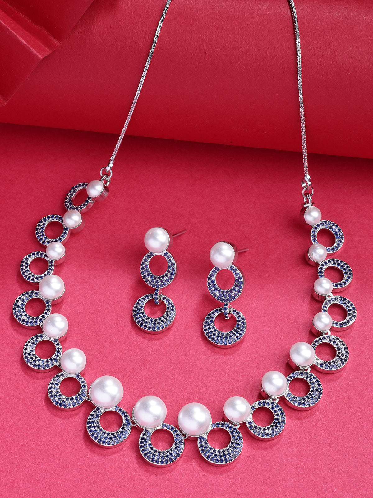Sukkhi Eye Catchy Rhodium Plated with Cubic Zirconia & Pearl Studded Blue Round Brass Collar Necklace with Drop Earrings Jewellery Set for Women|Latest Stylish Gifts for All Occasions|NS116020