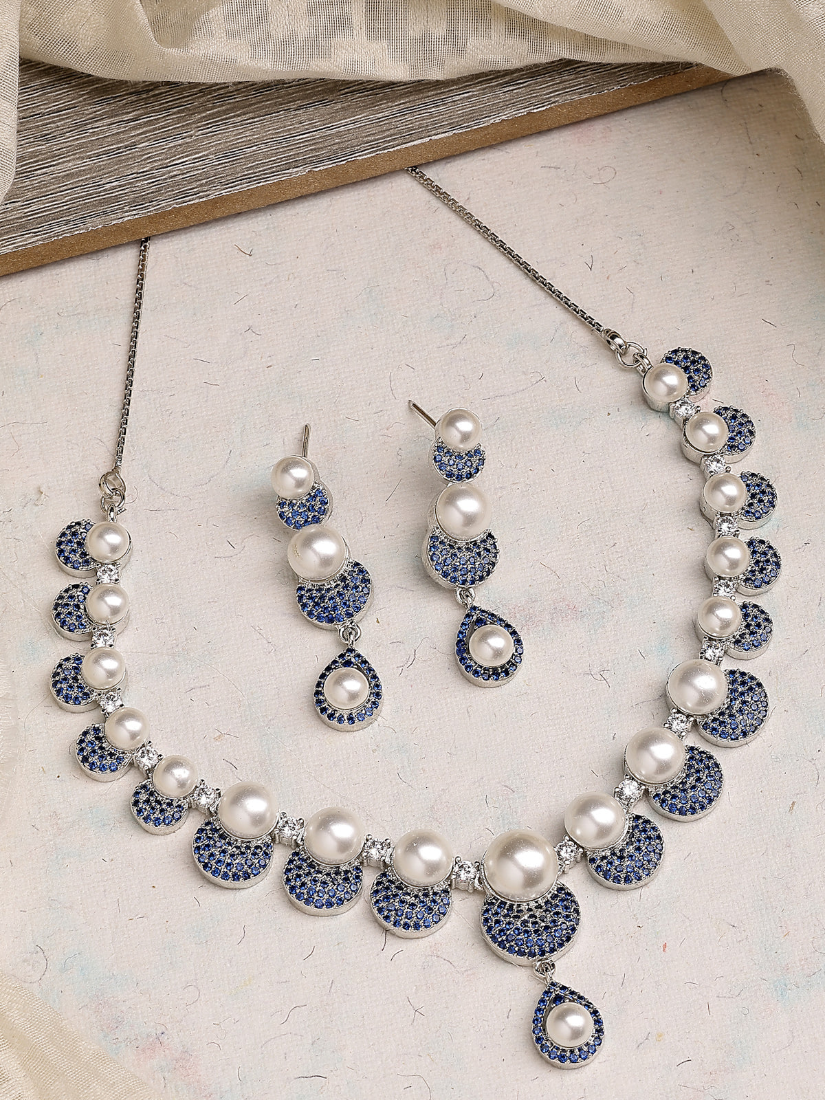 Sukkhi Smart Round Design Rhodium Plated with Cubic Zirconia & Pearl Studded Blue Brass Collar Necklace with Drop Earrings Jewellery Set for Women|Latest Stylish Gifts for All Occasions|NS116028