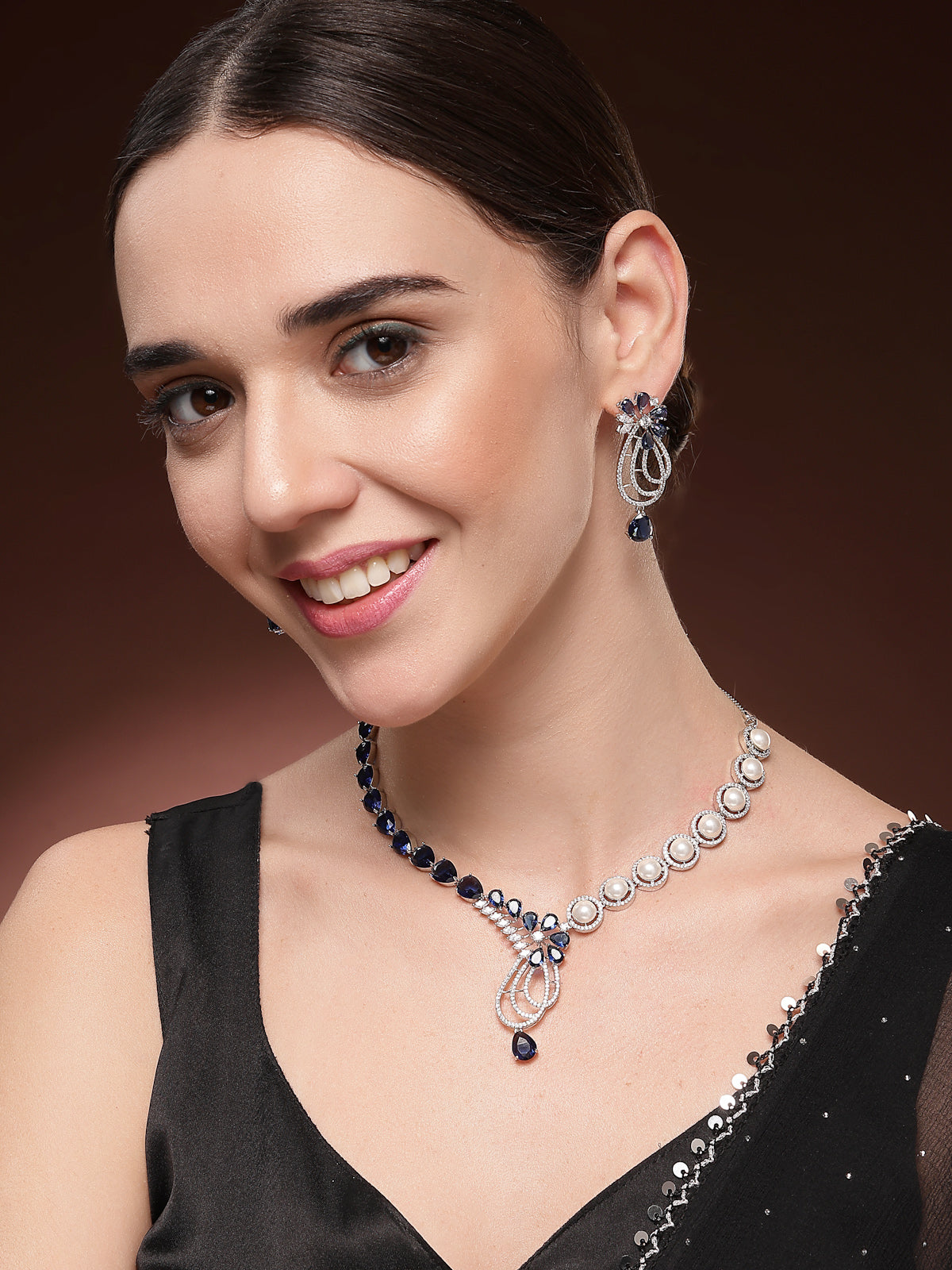 Sukkhi Classic Tear Drop Round Design Rhodium Plated Cubic Zirconia & Pearl Studded Blue Brass Collar Necklace & Drop Earrings Jewellery Set for Women|Latest Stylish Gifts for All Occasions|NS116057