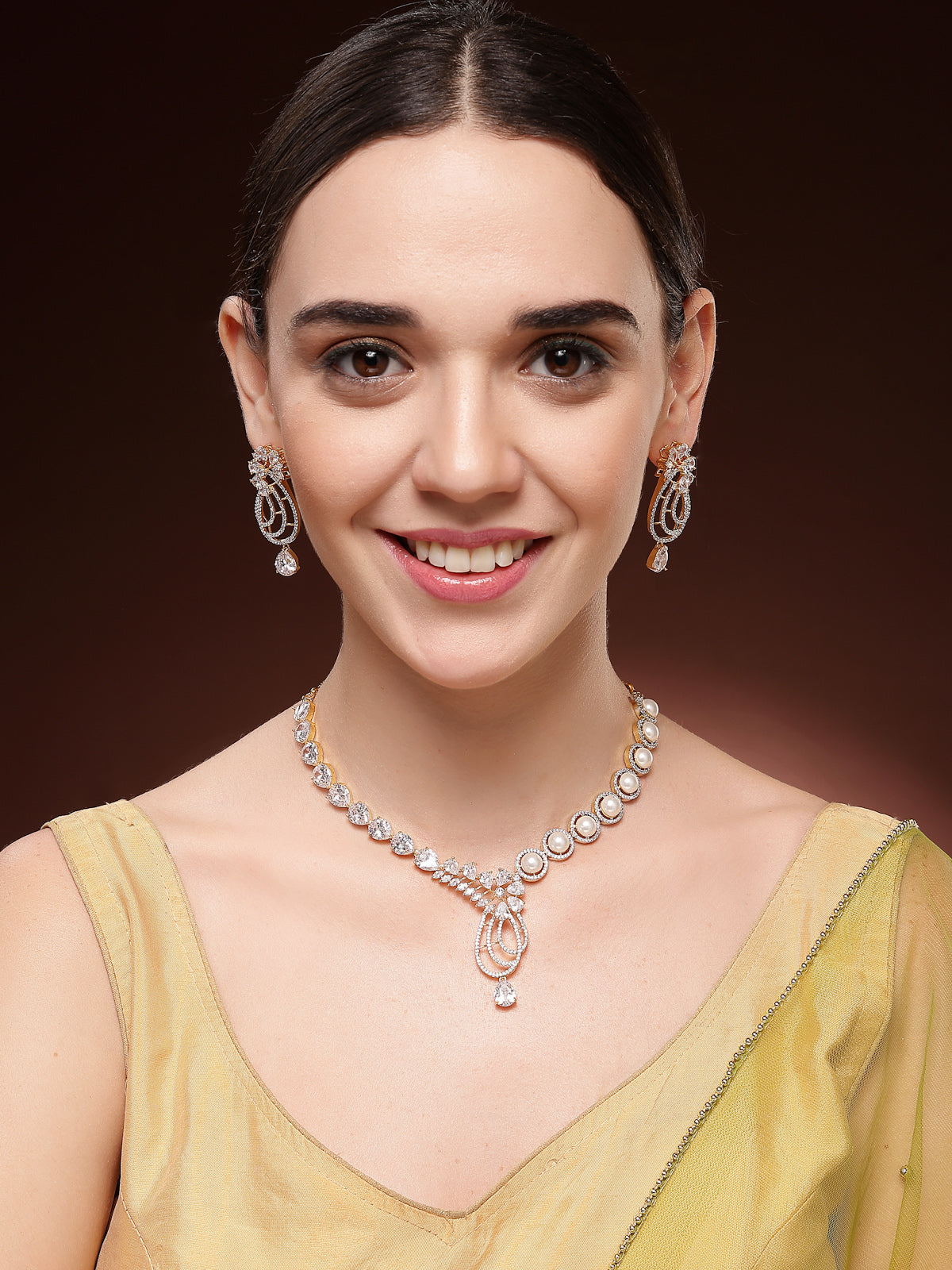 Sukkhi Admirable Tear Drop Round Design Gold Plated Cubic Zirconia & Pearl Studded White Brass Collar Necklace & Drop Earrings Jewellery Set for Women|Latest Stylish Gifts for All Occasions|NS116060