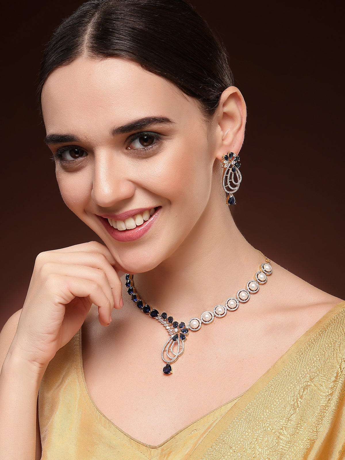 Sukkhi Unique Tear Drop Round Design Gold Plated Cubic Zirconia & Pearl Studded Blue Brass Collar Necklace with Drop Earrings Jewellery Set for Women|Latest Stylish Gifts for All Occasions|NS116063