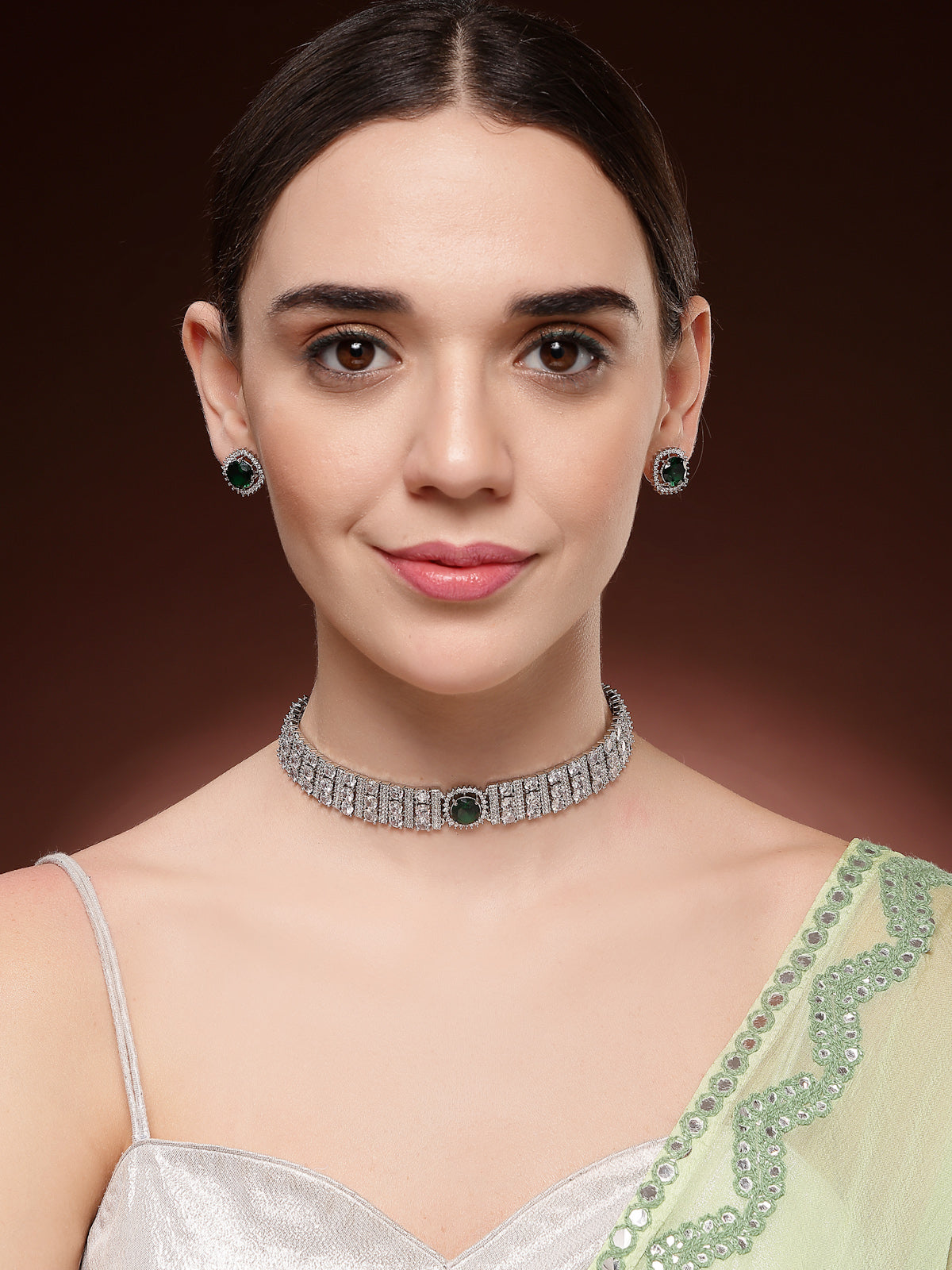 Sukkhi Delicate Fashionable Design Rhodium Plated Cubic Zirconia Studded Emerald Green Brass Choker Necklace with Studs Earrings Jewellery Set for Women|Latest Stylish Gift for All Occasions|NS116067