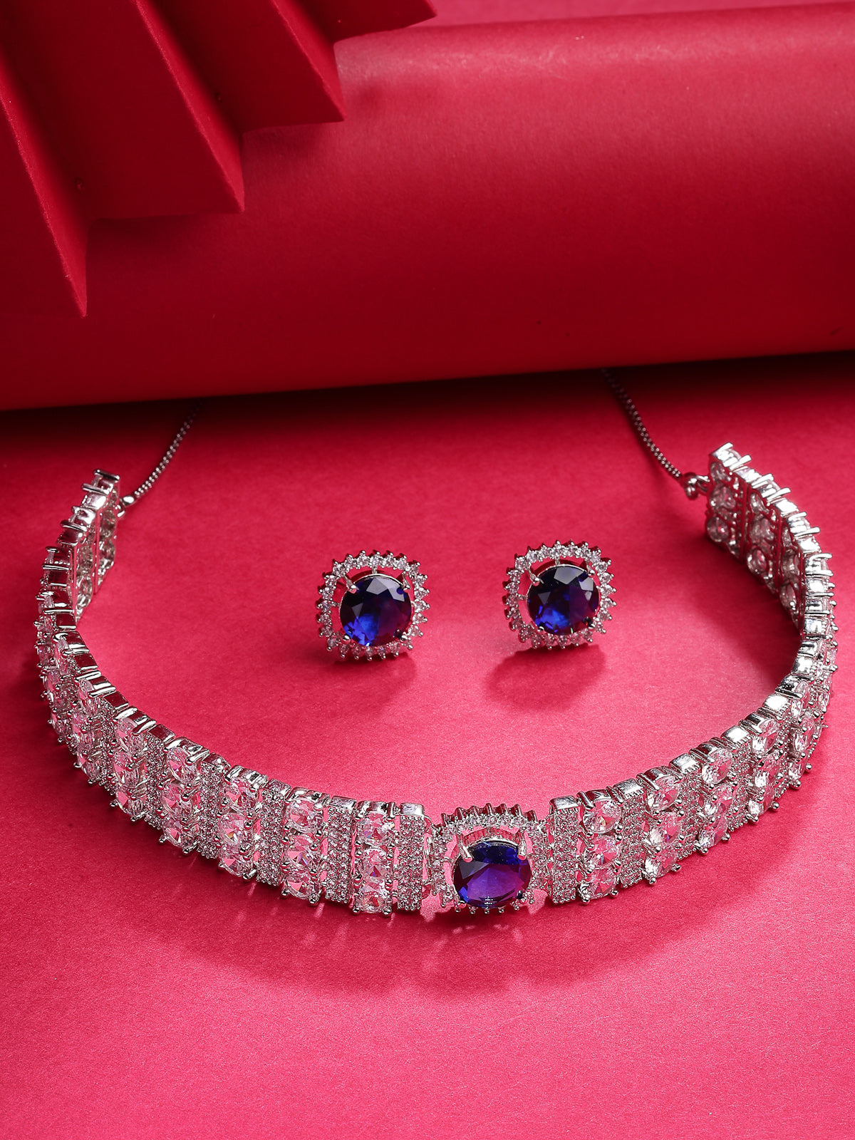 Sukkhi Iconic Blue Stylish Design Rhodium Plated Cubic Zirconia Studded Brass Choker Necklace with Studs Earrings Jewellery Set for Women|Latest Stylish Gifts for All Occasions|NS116069