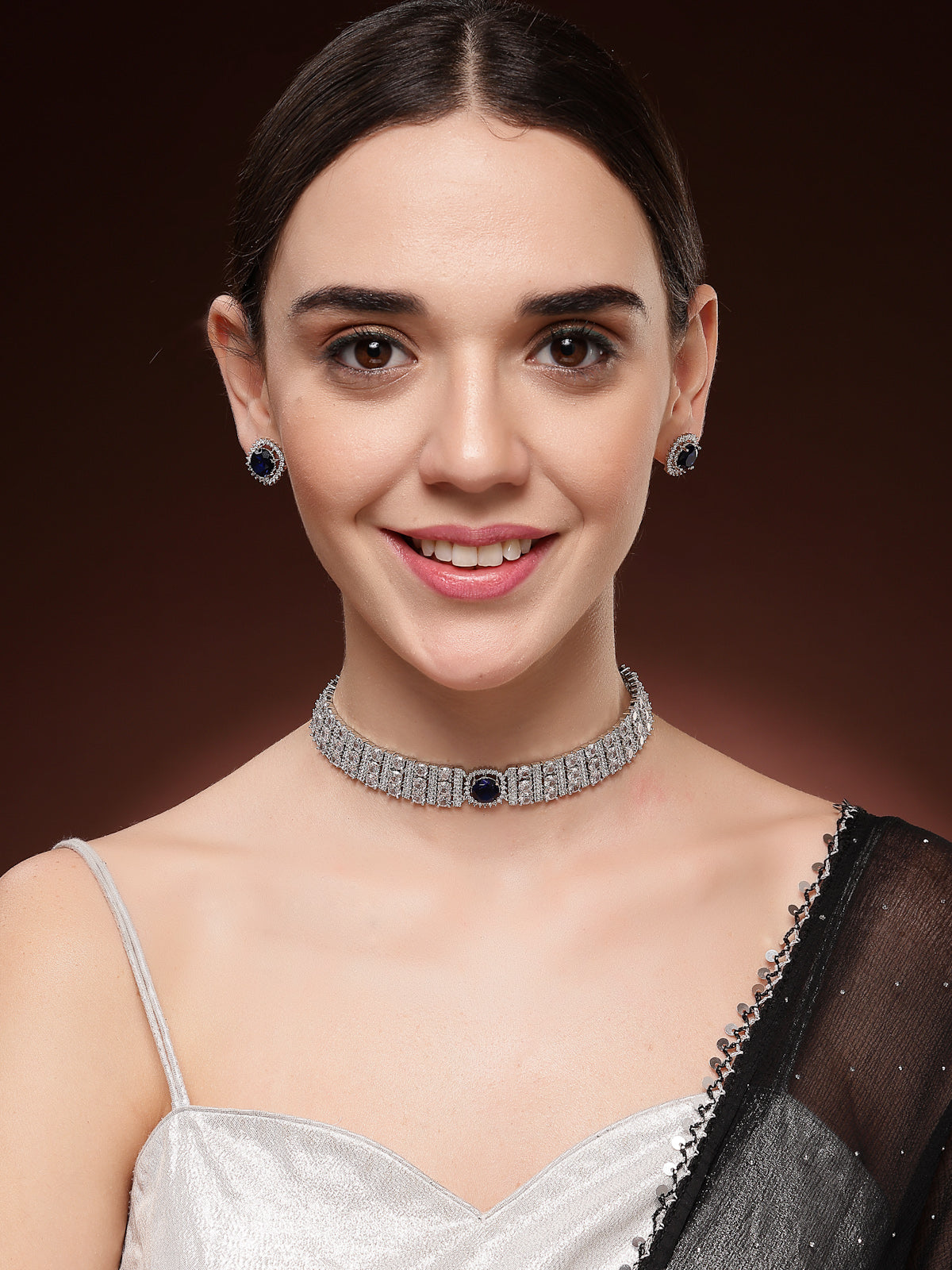 Sukkhi Iconic Blue Stylish Design Rhodium Plated Cubic Zirconia Studded Brass Choker Necklace with Studs Earrings Jewellery Set for Women|Latest Stylish Gifts for All Occasions|NS116069