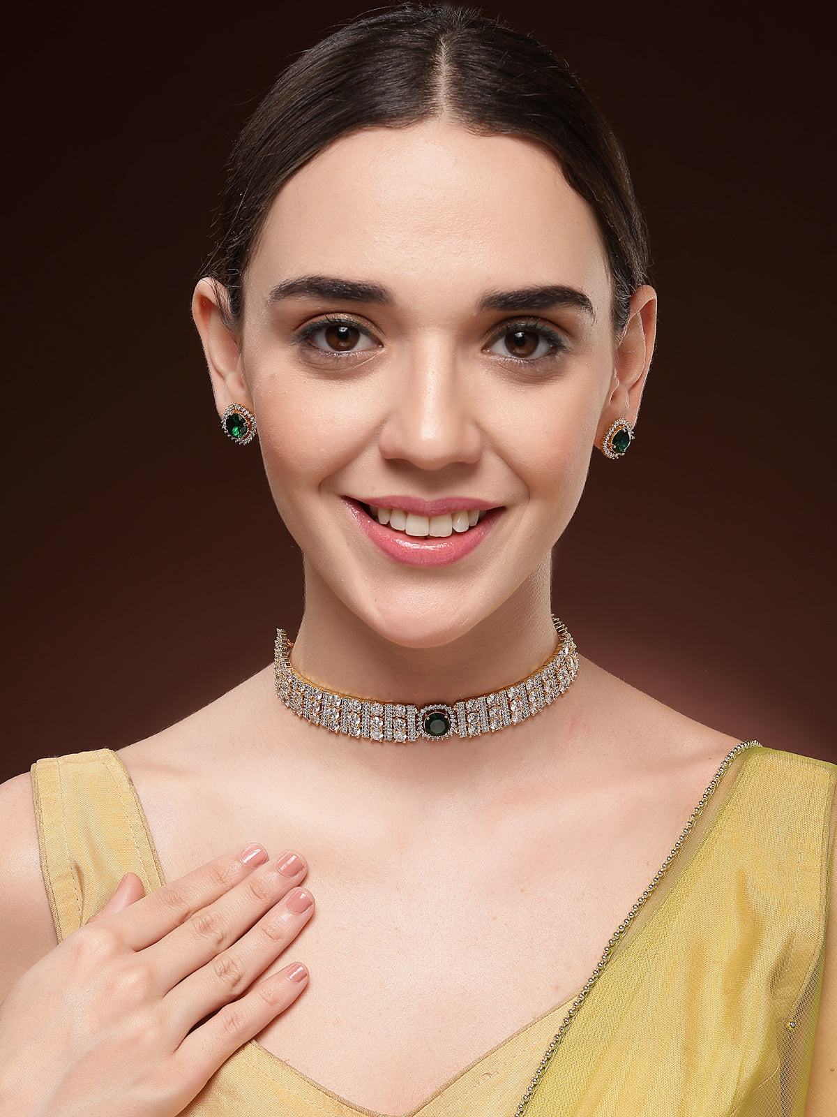 Sukkhi Eye Catchy Gold Plated Cubic Zirconia Studded Emerald Green Brass Choker Necklace with Studs Earrings Jewellery Set for Women|Latest Stylish Gifts for All Occasions|NS116073