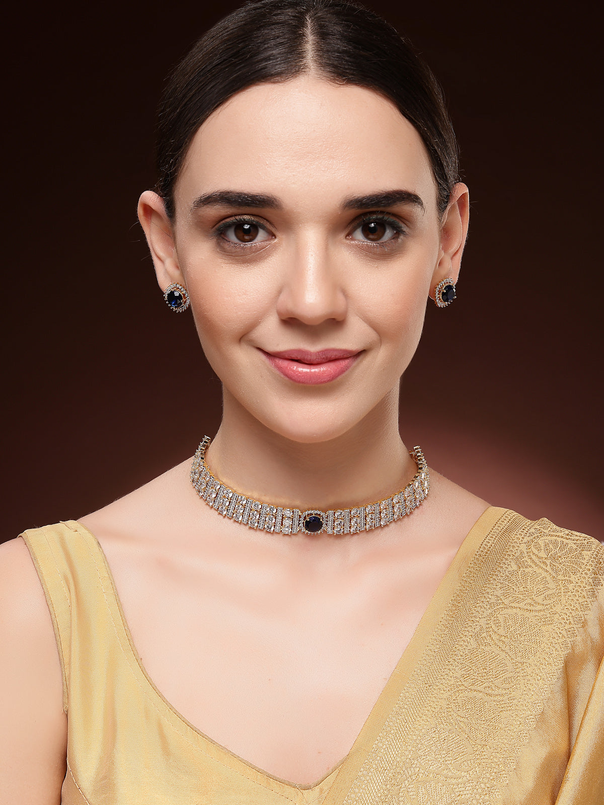 Sukkhi Lavish Gold Plated Cubic Zirconia Studded Blue Brass Choker Necklace with Studs Earrings Jewellery Set for Women|Latest Stylish Gifts for All Occasions|NS116075