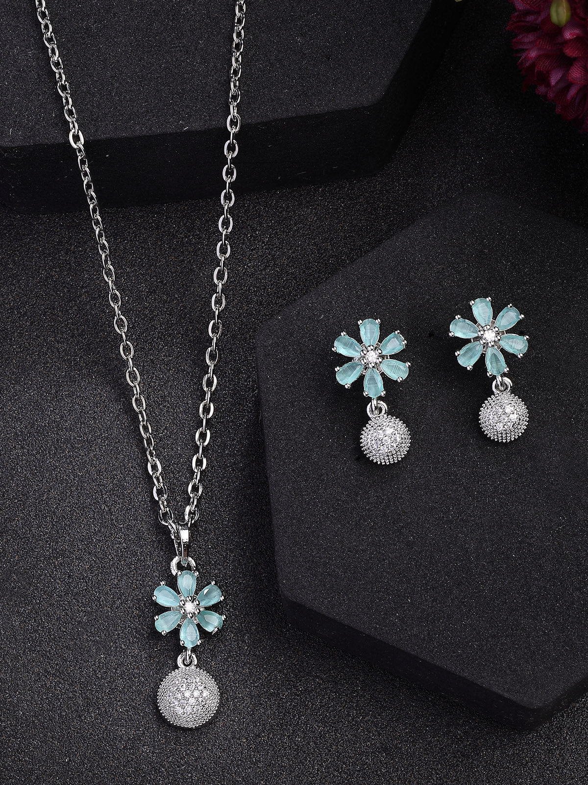 Sukkhi Nice-Looking Stylish Rhodium Plated Silver Toned Green Cubic Zirconia Studded Floral Shaped Cute Pendant with Box Chain & Drop Earrings Jewellery Set for Women & Girls |PS107432