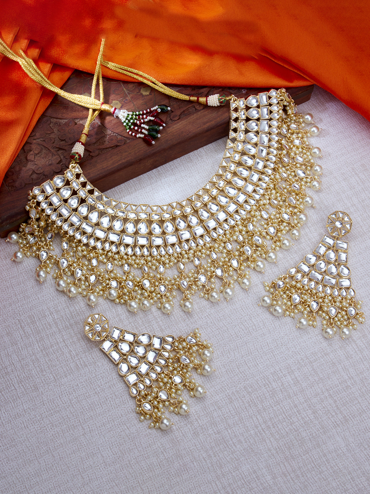 Sukkhi Glamorous Kundan Gold Plated Pearl Choker Necklace Set for Women SKR85709