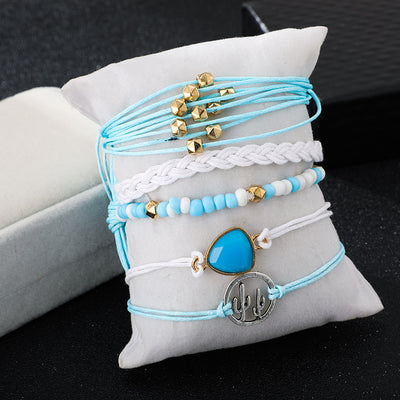 Scintillare by Sukkhi Alluring Multi Layered Threaded Bracelet for Women
