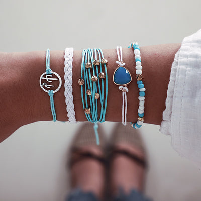 Scintillare by Sukkhi Alluring Multi Layered Threaded Bracelet for Women