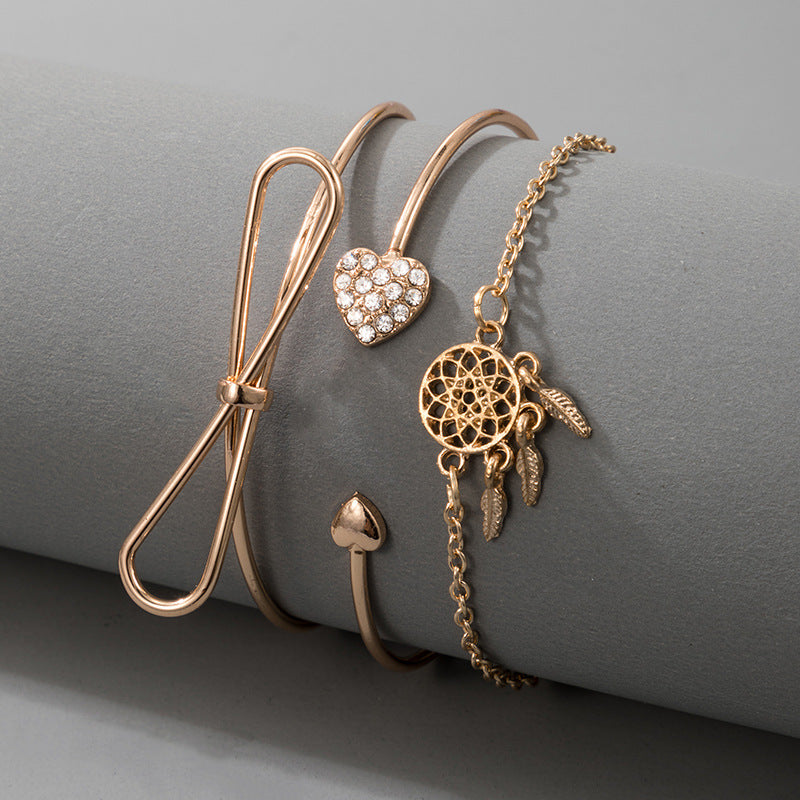 Scintillare by Sukkhi Stunning Multi Layered Gold Plated Dream Catcher Bracelet for Women