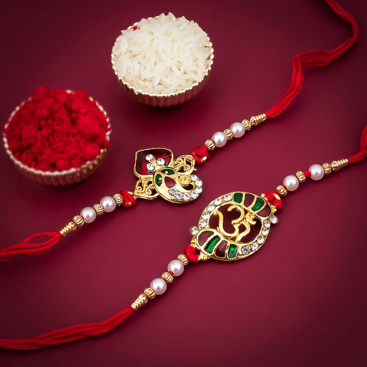 Sukkhi Stunning Gold Plated Ganesh and OM rakhi Set Combo (Set of 2 ) with Roli Chawal and Raksha Bandhan Greeting Card For Men