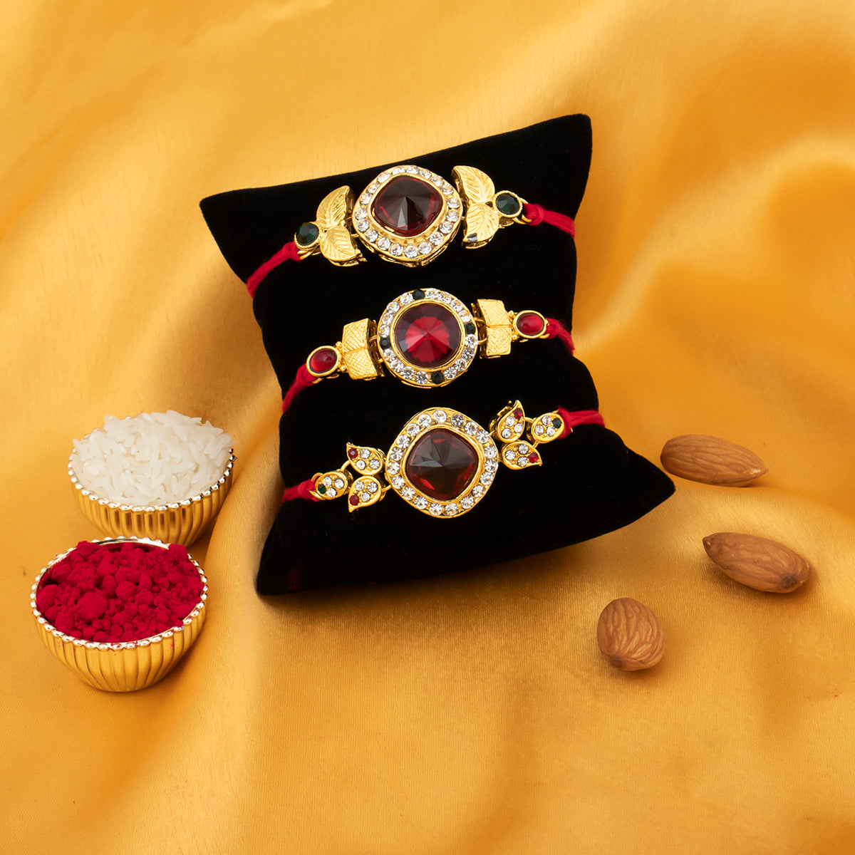 Sukkhi Royal Gold Plated Red Rakhi Combo (Set of 3 Rakhis)with Roli Chawal and Raksha Bandhan Greeting Card For Men