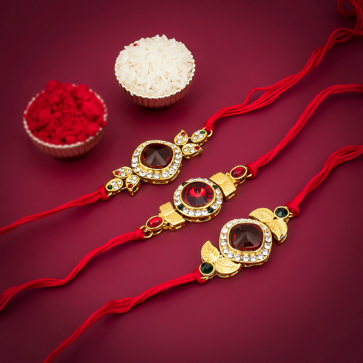 Sukkhi Royal Gold Plated Red Rakhi Combo (Set of 3 Rakhis)with Roli Chawal and Raksha Bandhan Greeting Card For Men