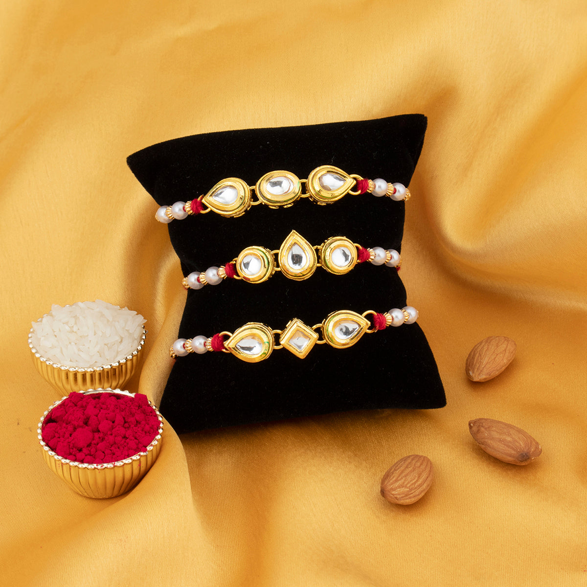 Sukkhi Incredible Kundan Gold Plated Rakhi Combo (Set of 3) with Roli Chawal and Raksha Bandhan Greeting Card For Men