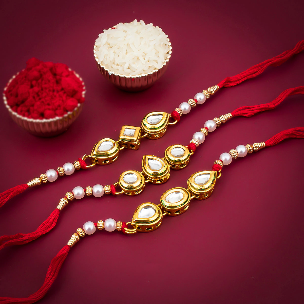 Sukkhi Incredible Kundan Gold Plated Rakhi Combo (Set of 3) with Roli Chawal and Raksha Bandhan Greeting Card For Men