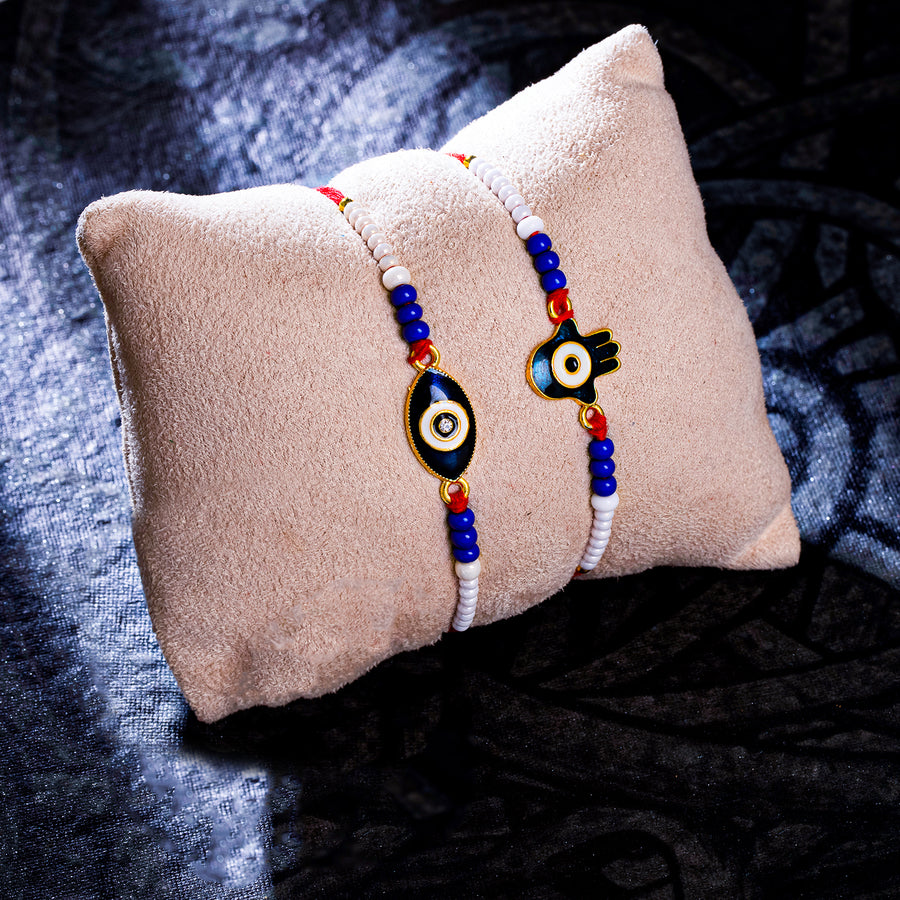 Sukkhi Lovely Gold Plated Evil Eye Rakhi Combo (Set of 2) with Roli Chawal and Raksha Bandhan Greeting Card For Men