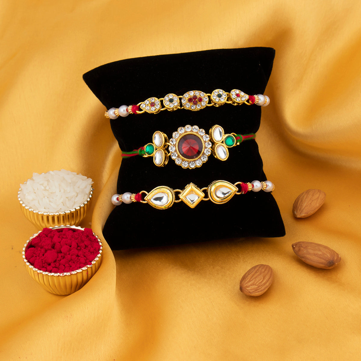 Sukkhi Delicate Gold Plated Kundan Rakhi Combo (Set of 3) with Roli Chawal and Raksha Bandhan Greeting Card For Men