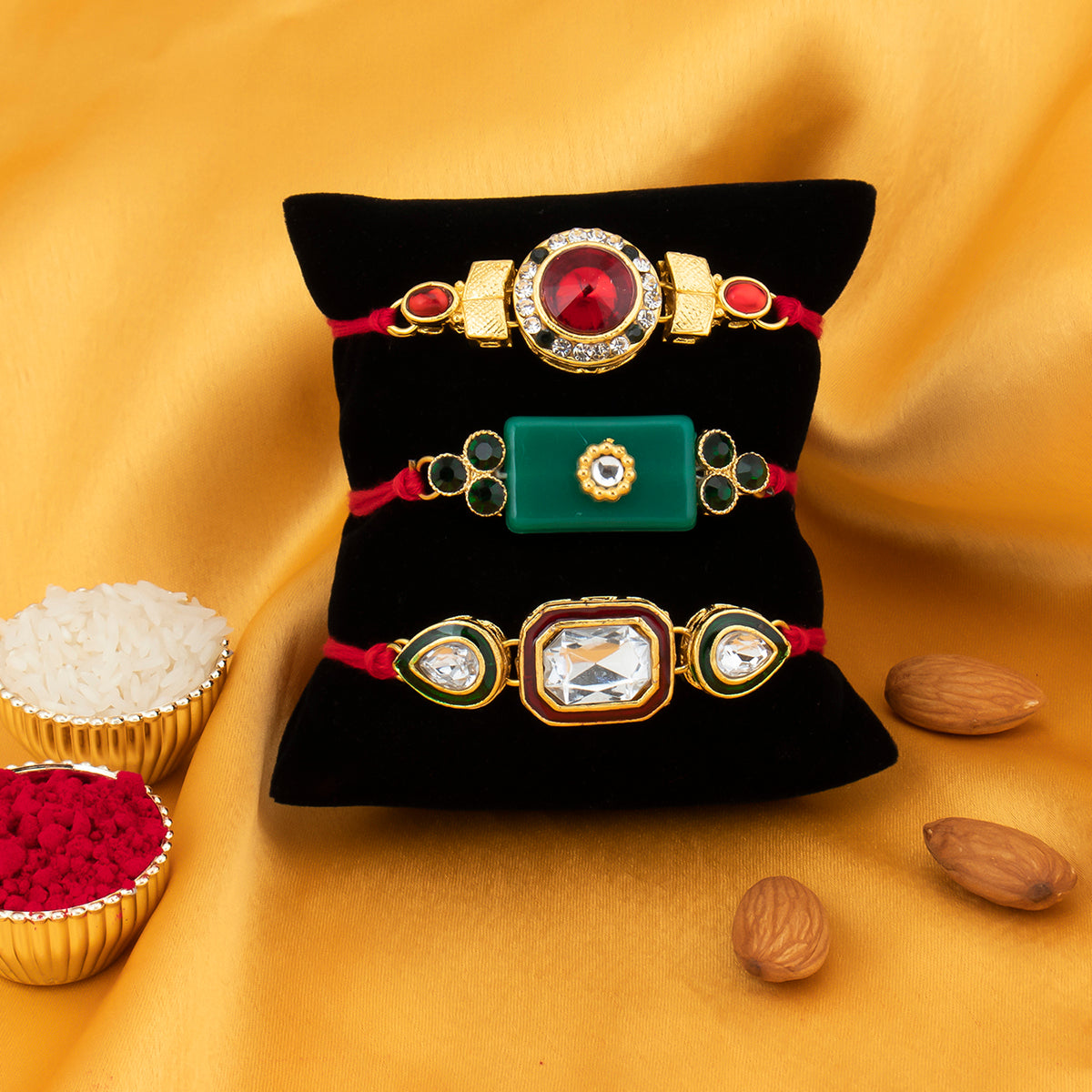 Sukkhi Glorious Gold Plated Austrian Diamond Rakhi Combo (Set of 3) with Roli Chawal and Raksha Bandhan Greeting Card For Men