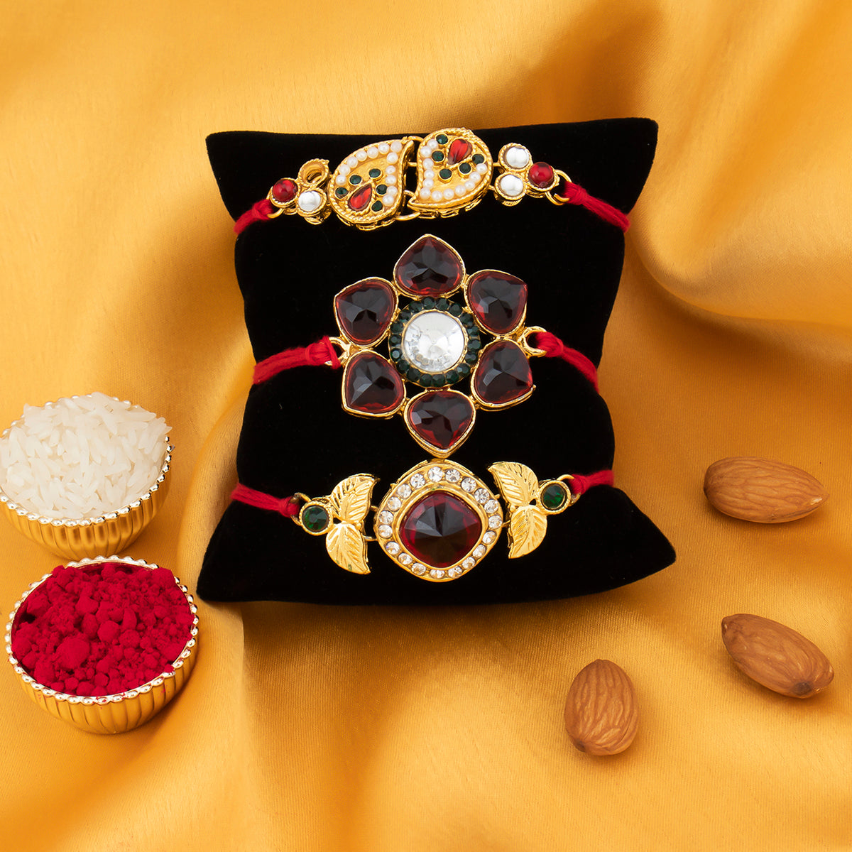 Sukkhi Splendid Gold Plated Pearl Rakhi Combo (Set of 3) with Roli Chawal and Raksha Bandhan Greeting Card For Men