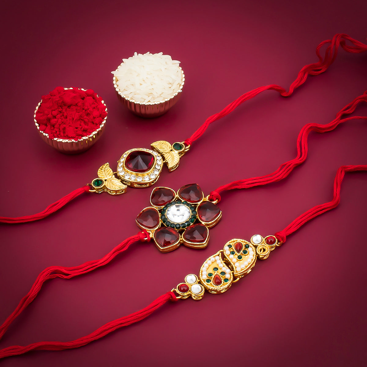 Sukkhi Splendid Gold Plated Pearl Rakhi Combo (Set of 3) with Roli Chawal and Raksha Bandhan Greeting Card For Men