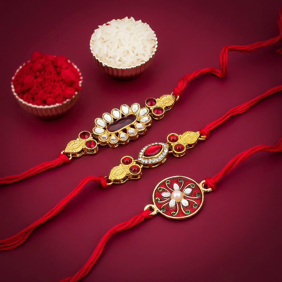 Sukkhi Eye-Catchy Gold Plated Kundan Meenakari Rakhi Combo (Set of 3) with Roli Chawal and Raksha Bandhan Greeting Card For Men